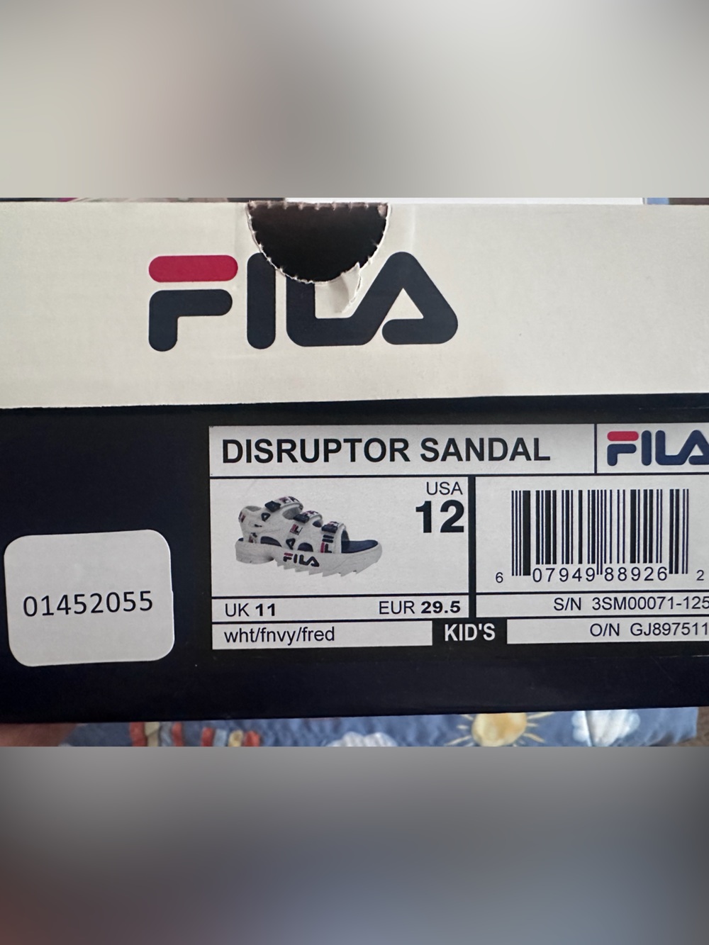 Fila Kids Disruptor Sandal in White with Navy and Red Accents